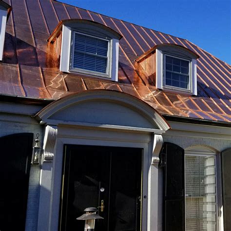 shiny copper metal porch roof on brown house|copper color metal roof panels.